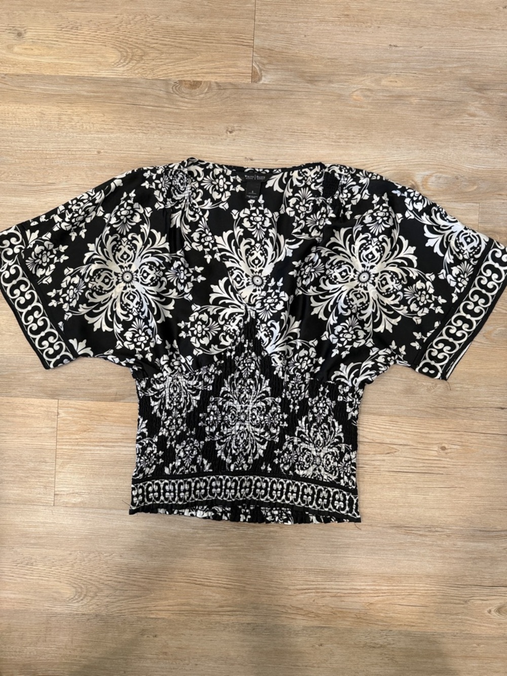 White House Black Market Black and White Floral Medallion Smocked Waist Top
